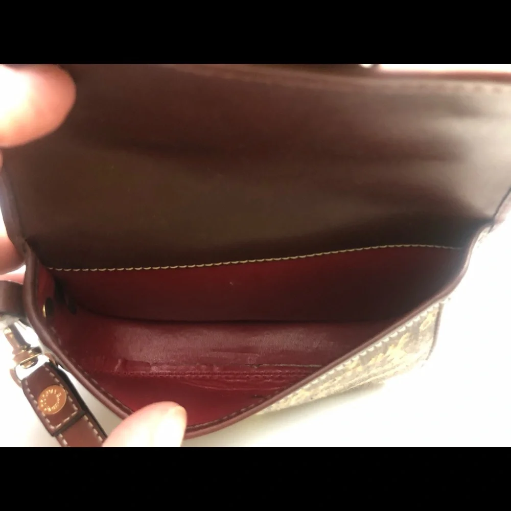 Dooney & Bourke vintage flap wristlet